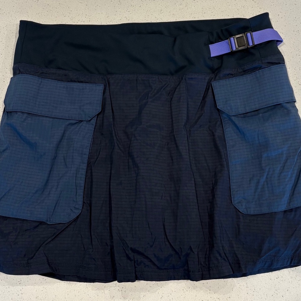 The North Face Navy and Black Outdoor Utility Skort with Purple synch tab/Buckle